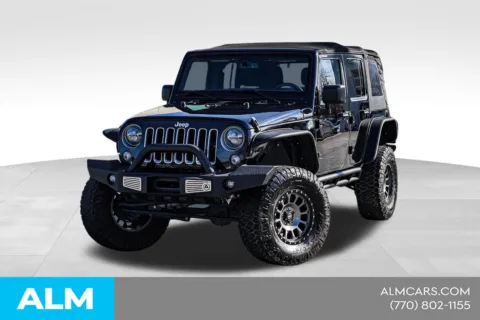 Black 2016 Jeep Wrangler Unlimited Sahara for sale in Newnan, GA