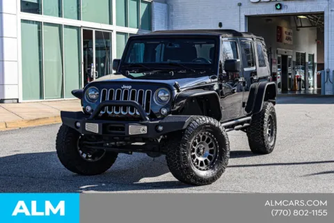 Black 2016 Jeep Wrangler Unlimited Sahara for sale in Newnan, GA