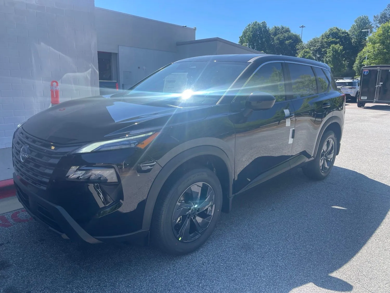 Black 2026 Nissan Rogue SV w/ Lifetime Powertrain Warranty for sale in Newnan, GA