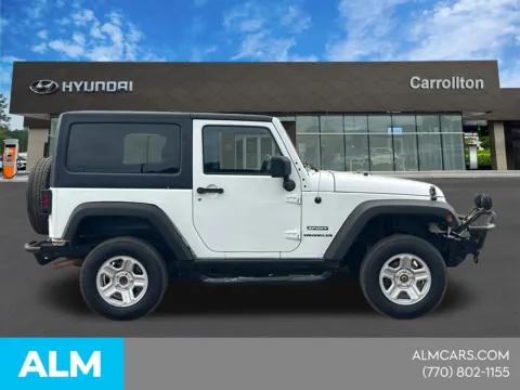 More photos of 2014 Jeep Wrangler Sport at ALM Nissan Newnan, GA
