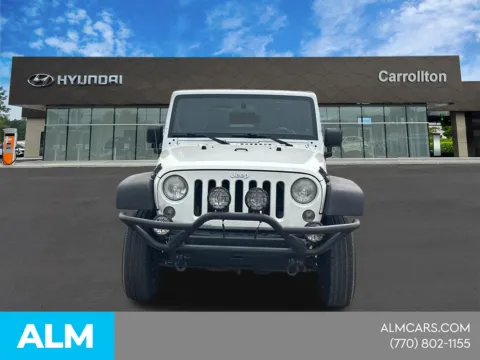 Photos of 2014 Jeep Wrangler Sport for sale in Newnan, GA at ALM Nissan Newnan