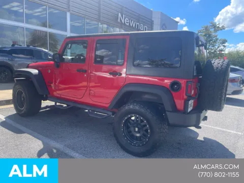 More photos of 2017 Jeep Wrangler Unlimited Sport - CALL 770-254-3800 at ALM Nissan Newnan, GA