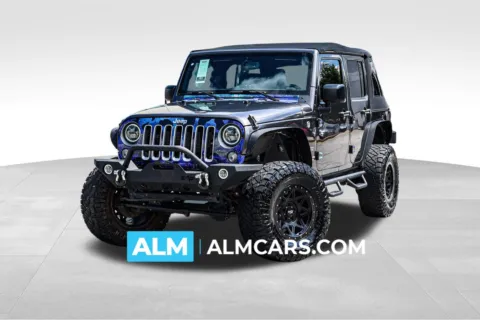 Gray 2017 Jeep Wrangler Unlimited Sahara for sale in Newnan, GA