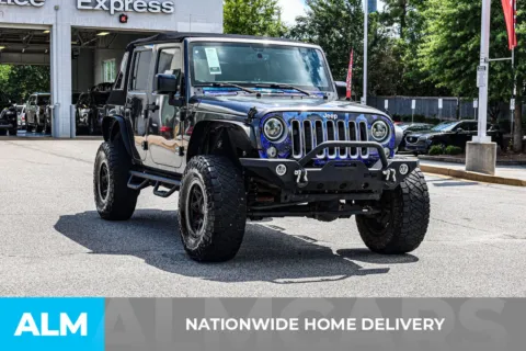 More photos of 2017 Jeep Wrangler Unlimited Sahara at ALM Nissan Newnan, GA