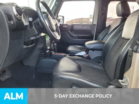 Another view of 2016 Jeep Wrangler Sahara for sale in Perry, GA at ALM Kia Perry