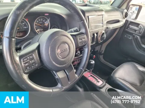 More photos of 2016 Jeep Wrangler Sahara at ALM Kia Perry, GA