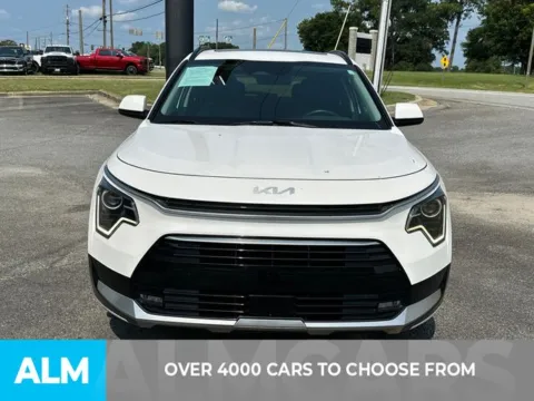 Photos of 2023 Kia Niro EX Touring for sale in Perry, GA at ALM Kia Perry