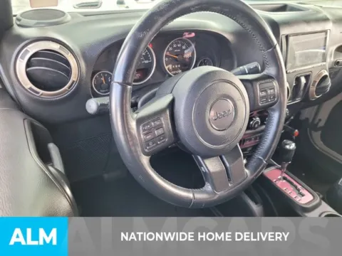 More photos of 2016 Jeep Wrangler Sahara at ALM Kia Perry, GA