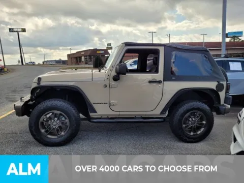 Another view of 2016 Jeep Wrangler Sahara for sale in Perry, GA at ALM Kia Perry