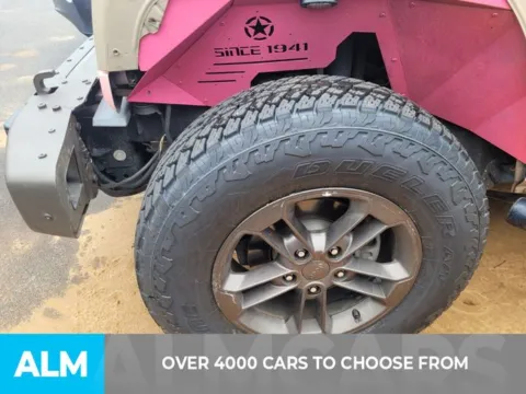 Another view of 2016 Jeep Wrangler Sahara for sale in Perry, GA at ALM Kia Perry