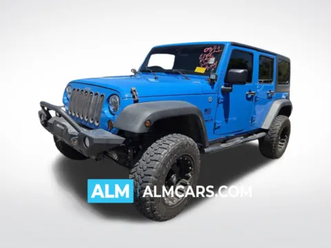 Blue 2011 Jeep Wrangler Unlimited Sport for sale in Perry, GA