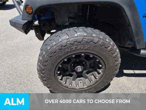Another view of 2011 Jeep Wrangler Unlimited Sport for sale in Perry, GA at ALM CDJR Perry