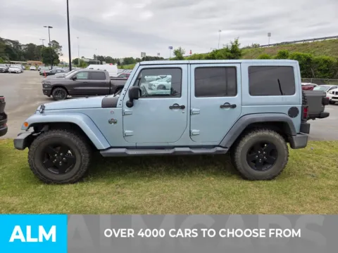 Another view of 2011 Jeep Wrangler Unlimited Sport for sale in Perry, GA at ALM CDJR Perry