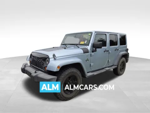 Blue 2011 Jeep Wrangler Unlimited Sport for sale in Perry, GA
