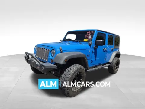 Blue 2011 Jeep Wrangler Unlimited Sport for sale in Perry, GA