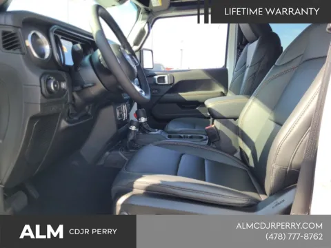 More photos of 2026 Jeep Wrangler Sahara at ALM CDJR Perry, GA