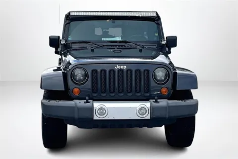 Photos of 2010 Jeep Wrangler Unlimited Sahara for sale in Spring Lake, MI at Lakeside Automotive Group