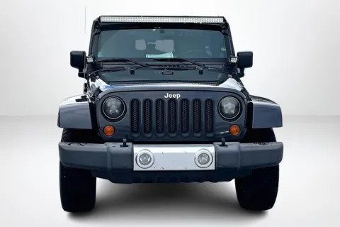 Photos of 2010 Jeep Wrangler Unlimited Sahara for sale in Spring Lake, MI at Lakeside Automotive Group