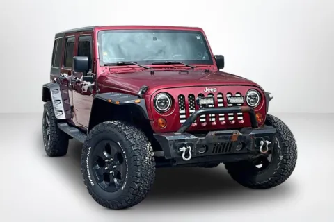 Another view of 2012 Jeep Wrangler Unlimited Sahara for sale in Spring Lake, MI at Lakeside Automotive Group