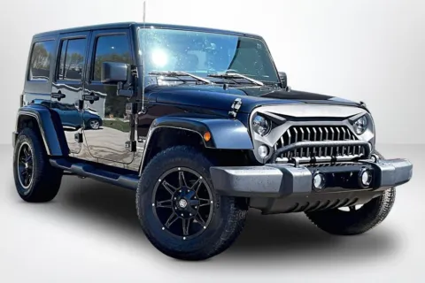 Another view of 2016 Jeep Wrangler Unlimited Sahara for sale in Spring Lake, MI at Lakeside Automotive Group