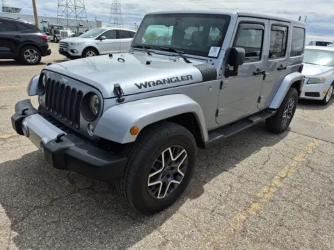Silver 2017 Jeep Wrangler Unlimited Sahara for sale in Spring Lake, MI
