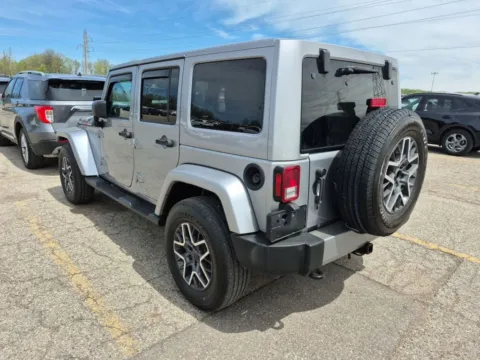 Photos of 2017 Jeep Wrangler Unlimited Sahara for sale in Spring Lake, MI at Lakeside Automotive Group