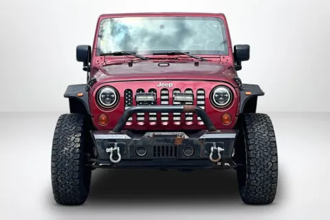 Photos of 2012 Jeep Wrangler Unlimited Sahara for sale in Spring Lake, MI at Lakeside Automotive Group
