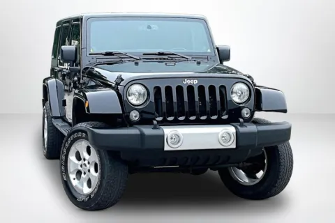 Another view of 2014 Jeep Wrangler Unlimited Sahara for sale in Spring Lake, MI at Lakeside Automotive Group