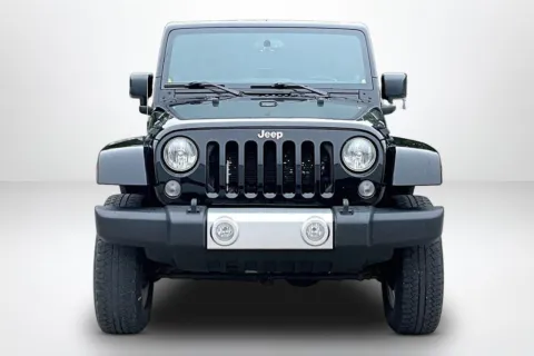 Photos of 2014 Jeep Wrangler Unlimited Sahara for sale in Spring Lake, MI at Lakeside Automotive Group