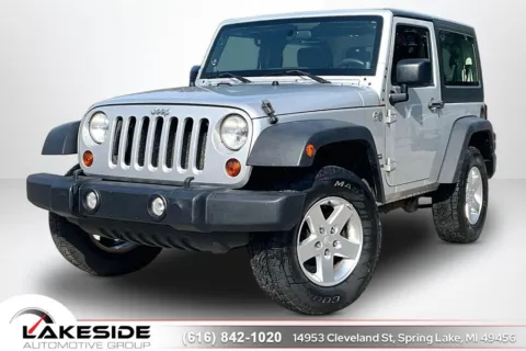 Silver 2011 Jeep Wrangler Sport for sale in Spring Lake, MI
