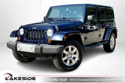 Blue 2013 Jeep Wrangler Unlimited Sahara for sale in Spring Lake, MI