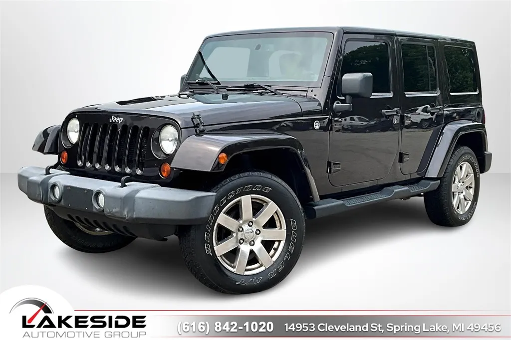 Brown 2013 Jeep Wrangler Unlimited Sahara for sale in Spring Lake, MI