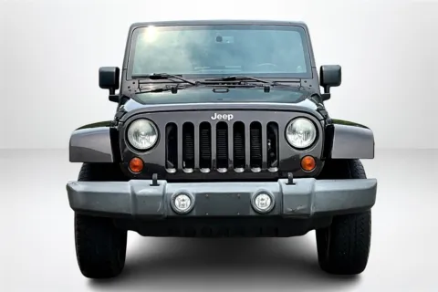 Photos of 2013 Jeep Wrangler Unlimited Sahara for sale in Spring Lake, MI at Lakeside Automotive Group