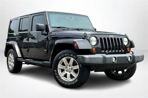 Another view of 2013 Jeep Wrangler Unlimited Sahara for sale in Spring Lake, MI at Lakeside Automotive Group