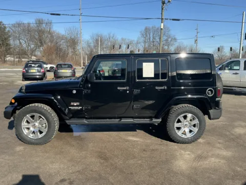 Another view of 2016 JEEP WRANGLER UNLIMI SAHARA for sale in Camby, IN at Mr. Care Auto