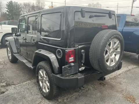 Photos of 2016 JEEP WRANGLER UNLIMI SAHARA for sale in Camby, IN at Mr. Care Auto