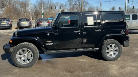 More photos of 2016 JEEP WRANGLER UNLIMI SAHARA at Mr. Care Auto, IN