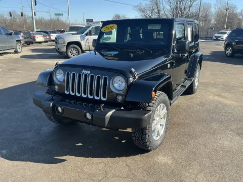 Another view of 2016 JEEP WRANGLER UNLIMI SAHARA for sale in Camby, IN at Mr. Care Auto