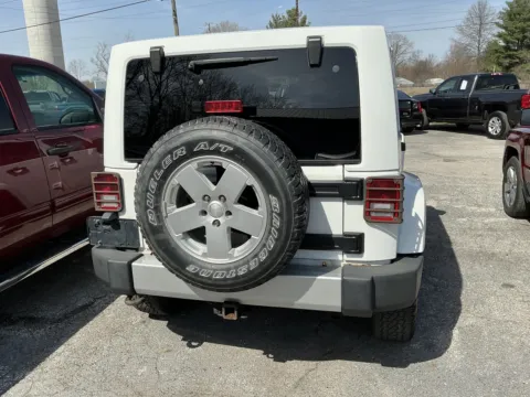 More photos of 2012 JEEP WRANGLER UNLIMI SAHARA at Mr. Care Auto, IN