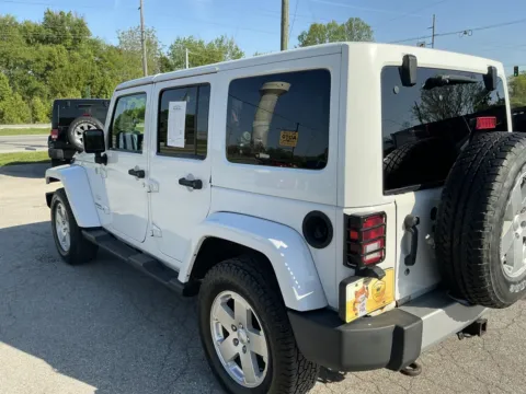 More photos of 2012 JEEP WRANGLER UNLIMI SAHARA at Mr. Care Auto, IN