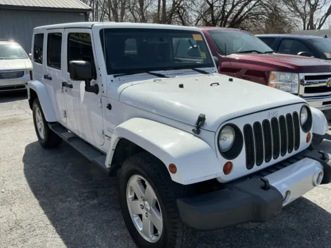 Another view of 2012 JEEP WRANGLER UNLIMI SAHARA for sale in Camby, IN at Mr. Care Auto