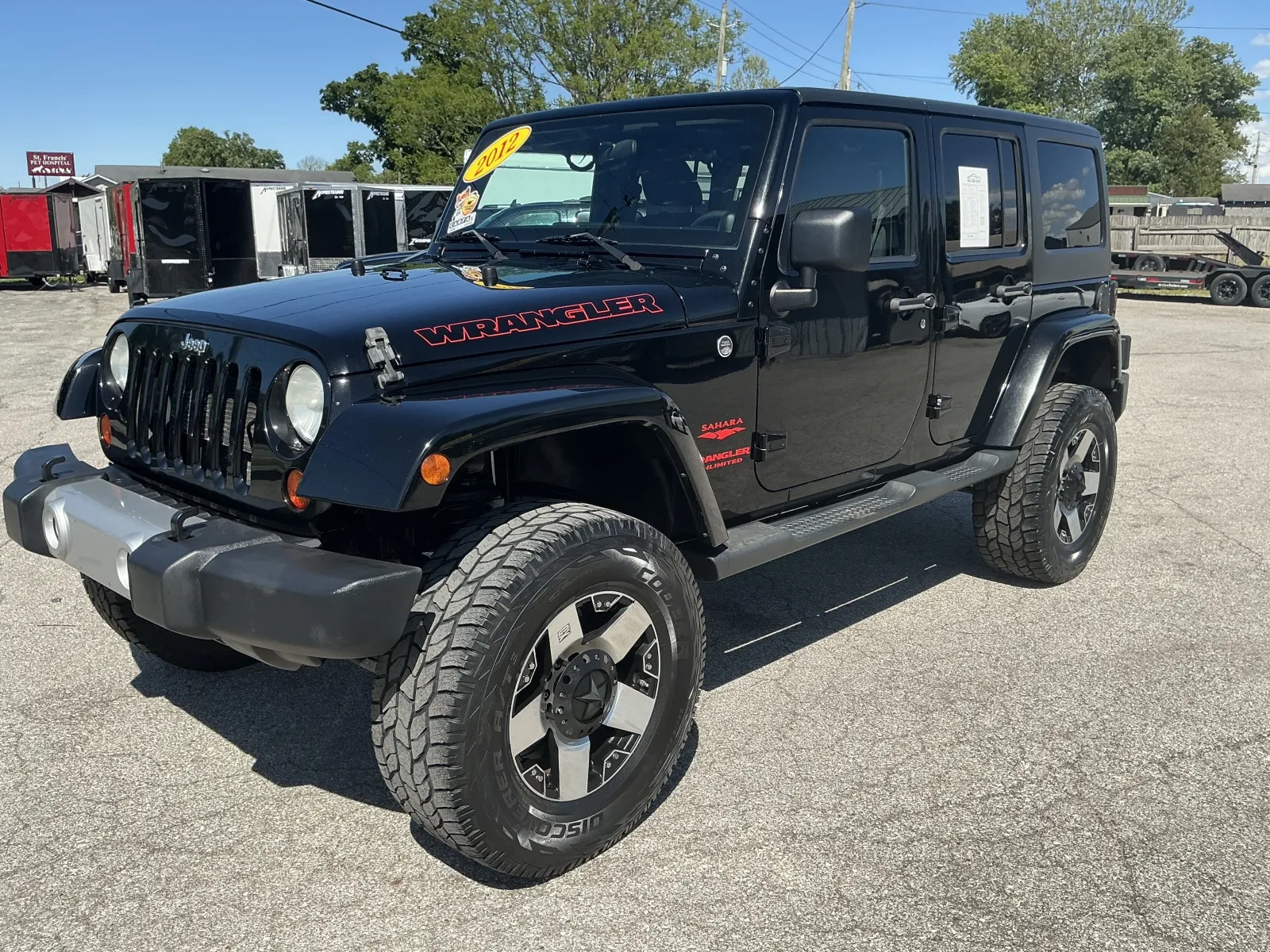 Black 2012 JEEP WRANGLER UNLIMI SAHARA for sale in Camby, IN