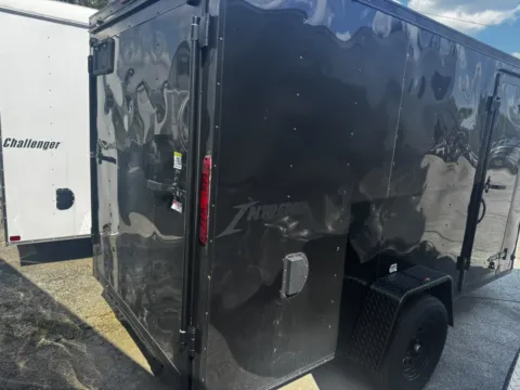 More photos of 2026 HOMESTEADER 612IS ENCLOSED at Mr. Care Auto, IN