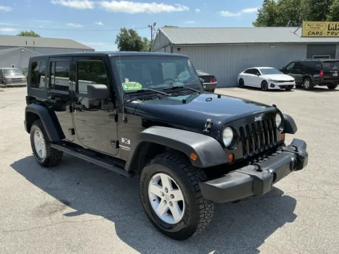 Black 2009 JEEP WRANGLER UNLIMI X for sale in Camby, IN