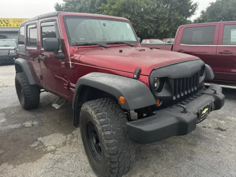 Red 2011 JEEP WRANGLER UNLIMI SPORT for sale in Camby, IN