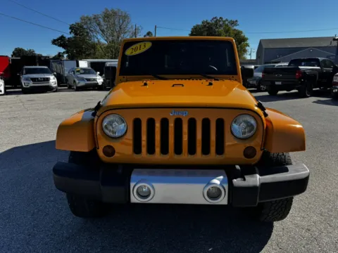 Another view of 2013 JEEP WRANGLER UNLIMI SAHARA for sale in Camby, IN at Mr. Care Auto