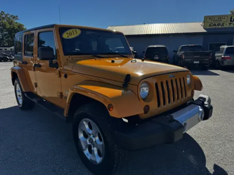 Photos of 2013 JEEP WRANGLER UNLIMI SAHARA for sale in Camby, IN at Mr. Care Auto