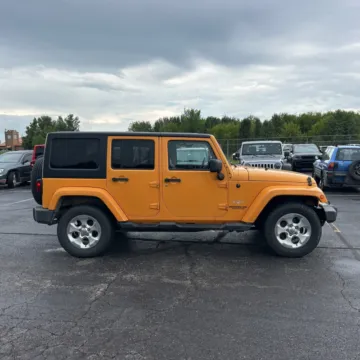More photos of 2013 Jeep Wrangler Unlimited Sahara at Mr. Care Auto, IN