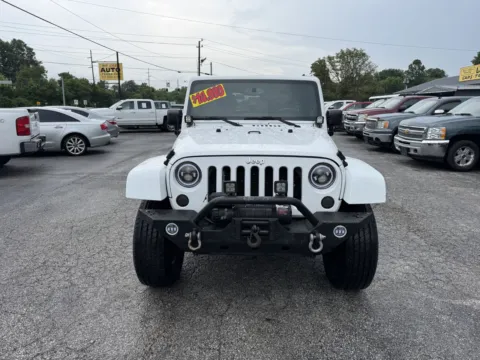Photos of 2014 Jeep Wrangler Unlimited Sahara for sale in Camby, IN at Mr. Care Auto