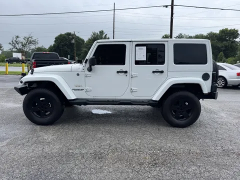 More photos of 2014 Jeep Wrangler Unlimited Sahara at Mr. Care Auto, IN